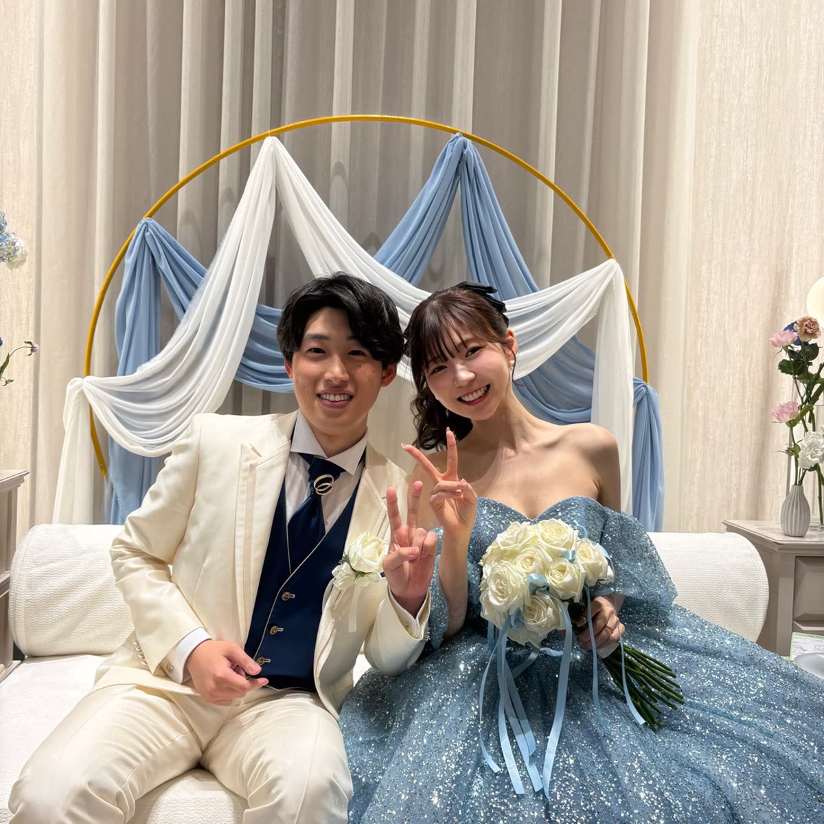 Couple seated together at their wedding reception in Japan, a CJC wedding-film client